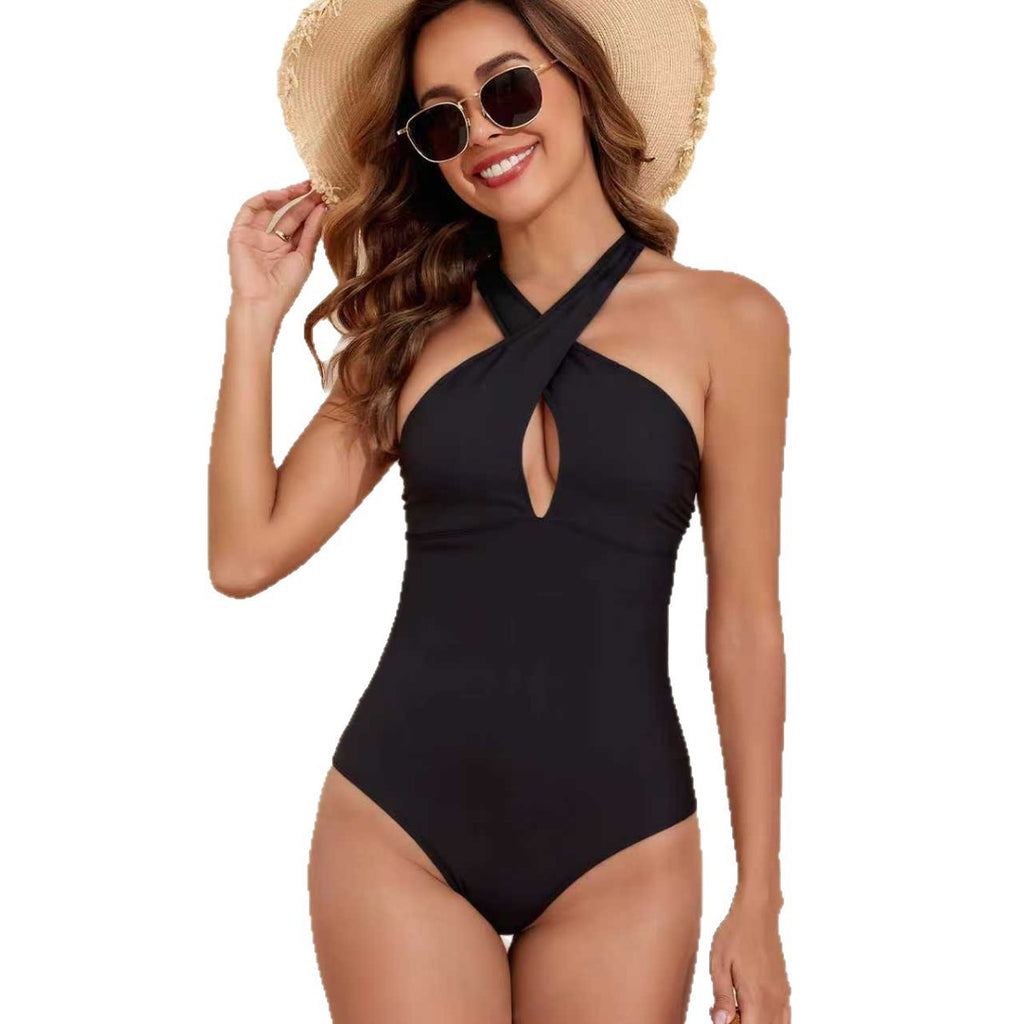 Black one-piece swimsuit with tight cross neck strap and exposed back